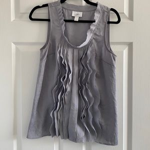 Ruffle front sleeveless blouse